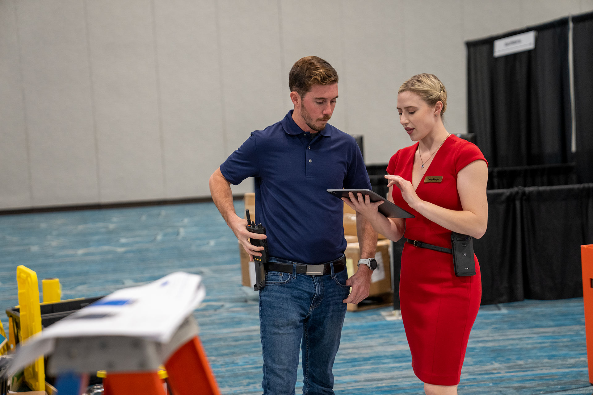 two people looking at a tablet