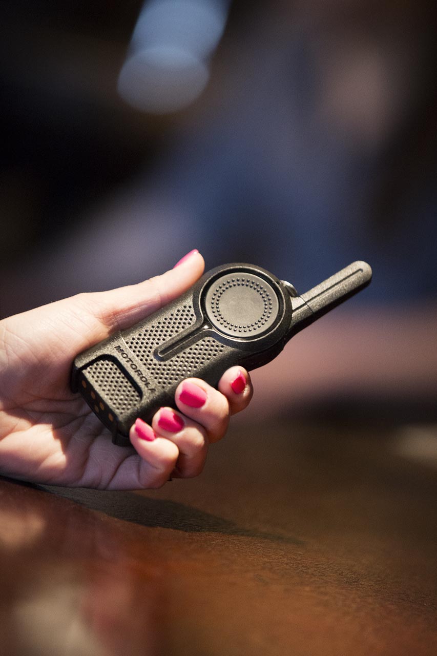 hand holding a walkie talkie